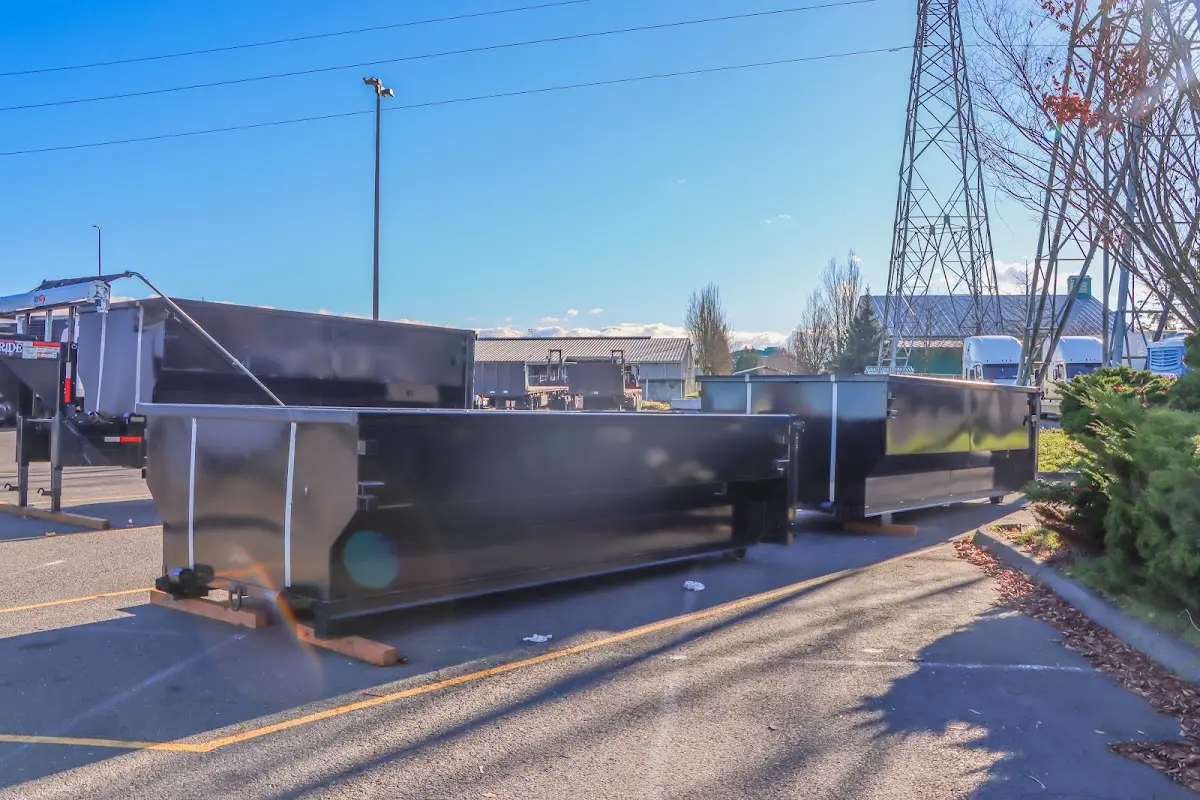 Roll-off dumpster ready for waste disposal at job site for 3 Yard Dumpster Rental in Ramapo